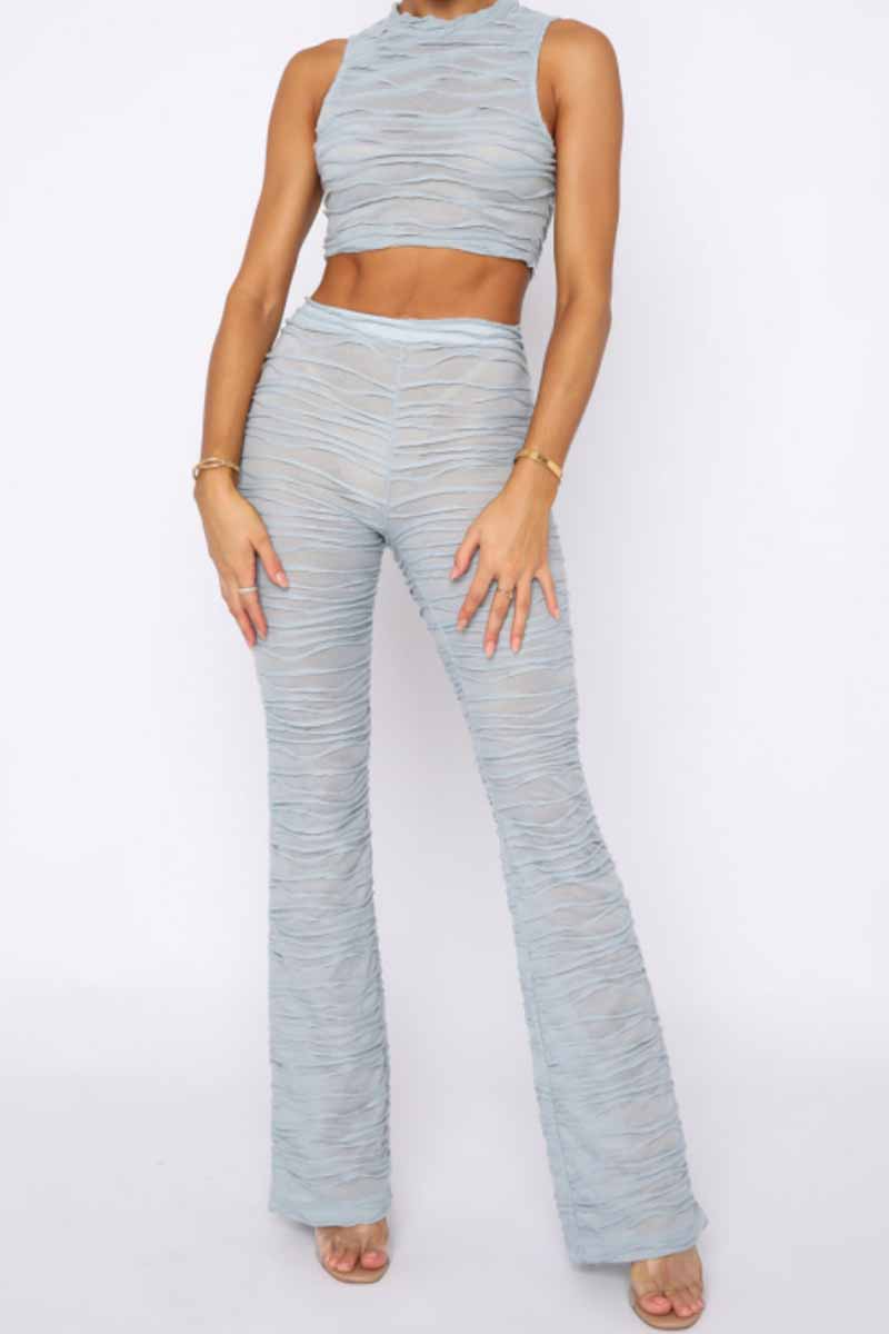 Priya - Elegante completo con top plissettato smanicato e pantaloni a gamba larga
