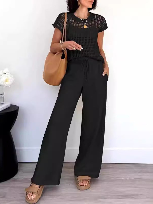 Delphine - Completo casual con top in maglia traforata e pantaloni a gamba larga