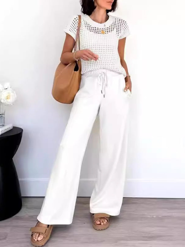 Delphine - Completo casual con top in maglia traforata e pantaloni a gamba larga