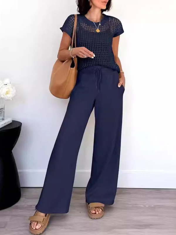 Delphine - Completo casual con top in maglia traforata e pantaloni a gamba larga