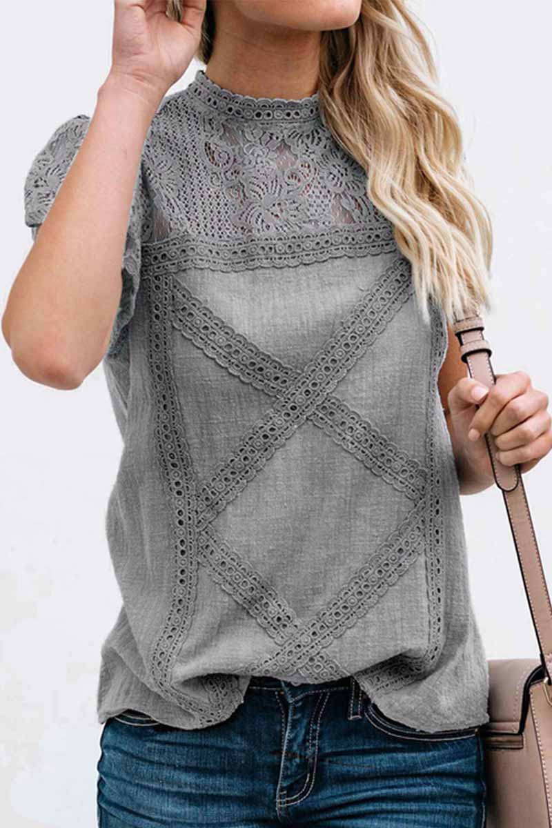 Laila - Blusa chic in pizzo geometrico a maniche corte