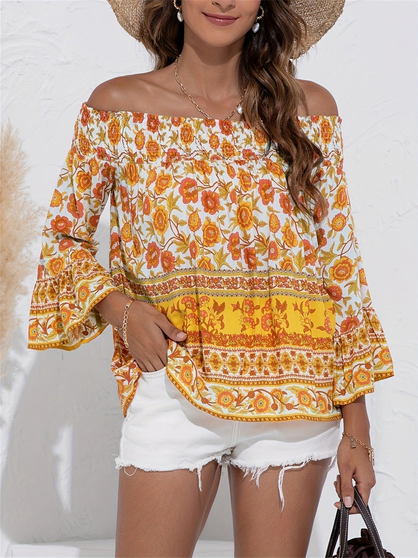 Audrey - Elegante blusa con estampato floreale e spalle scoperte