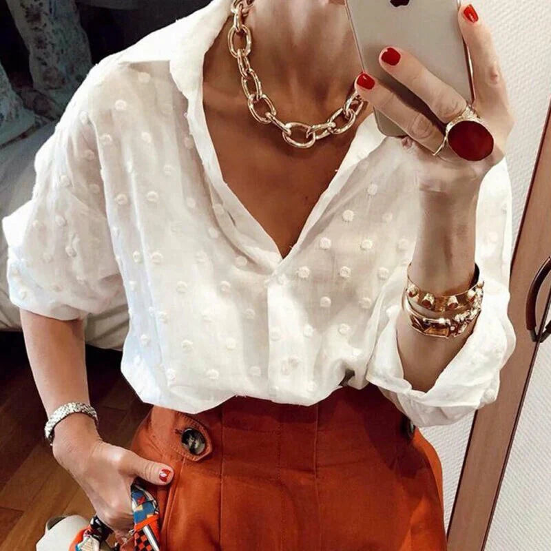 Celia - Elegante top a maniche lunghe con pois