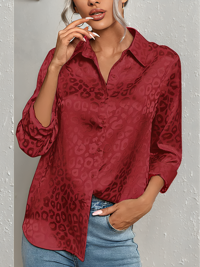 Quinasha – Elegante blusa polo a maniche lunghe con stampa leopardata