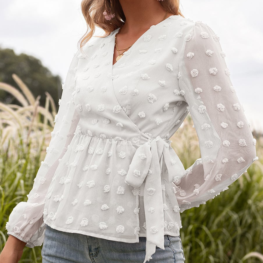 Orietta - Elegante blusa in pizzo con scollo a V e maniche lunghe