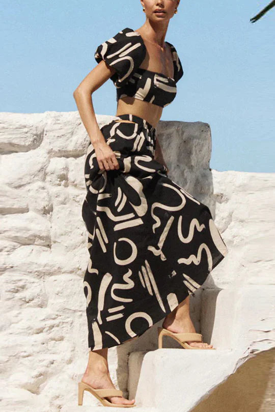 Allegra Doodle - Set top off shoulder stampato e maxi gonna con ritagli tascabili