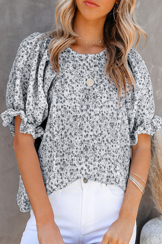 Marlene - Elegante blusa floreale con maniche a sbuffo