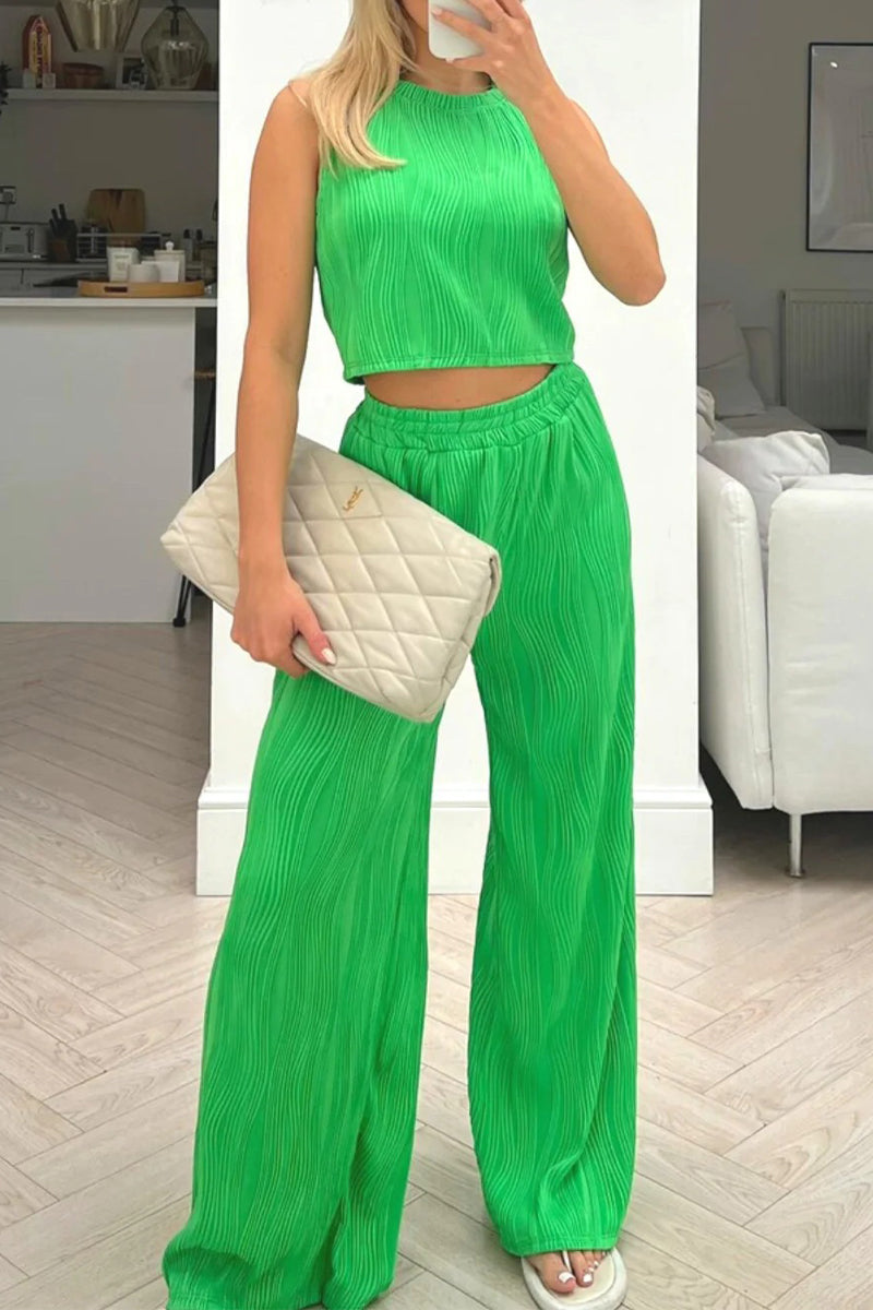 Rina - Completo elegante con top smanicato e pantaloni a vita alta