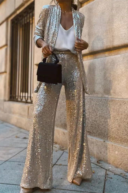 Kiara - Elegante completo con giacca aperta di paillettes e pantaloni a gamba larga