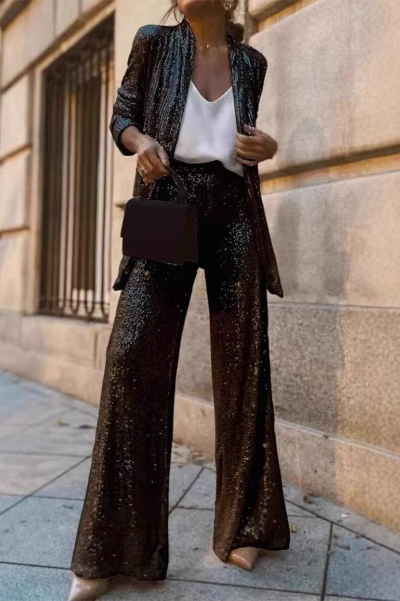 Kiara - Elegante completo con giacca aperta di paillettes e pantaloni a gamba larga