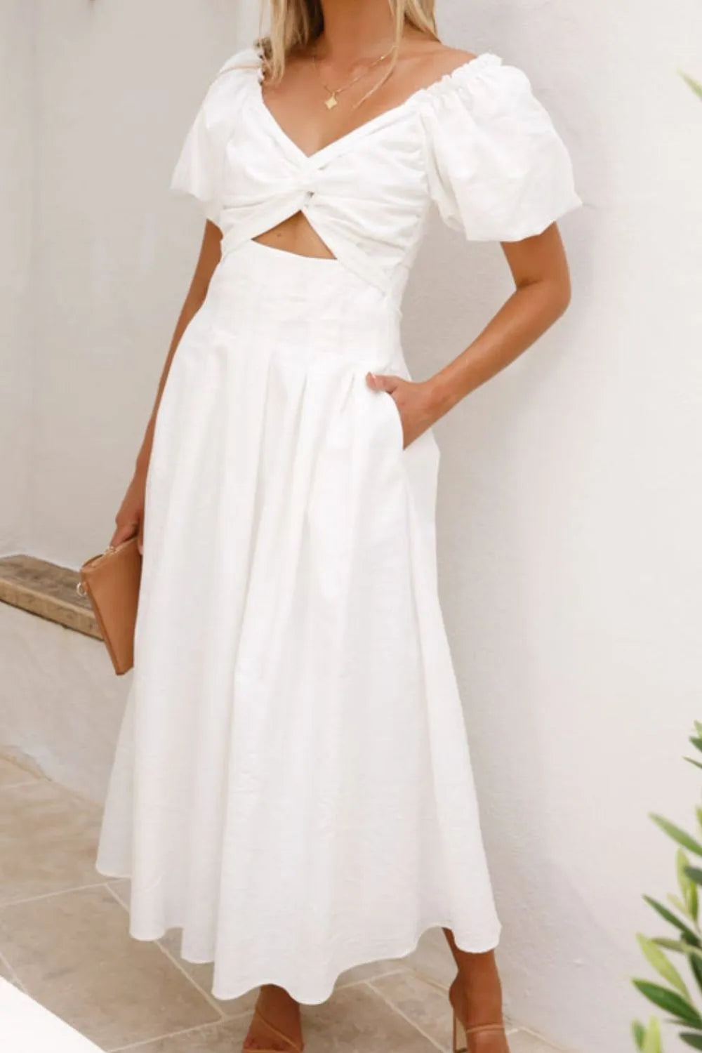 Nicolle - Elegante abito con maniche a sbuffo