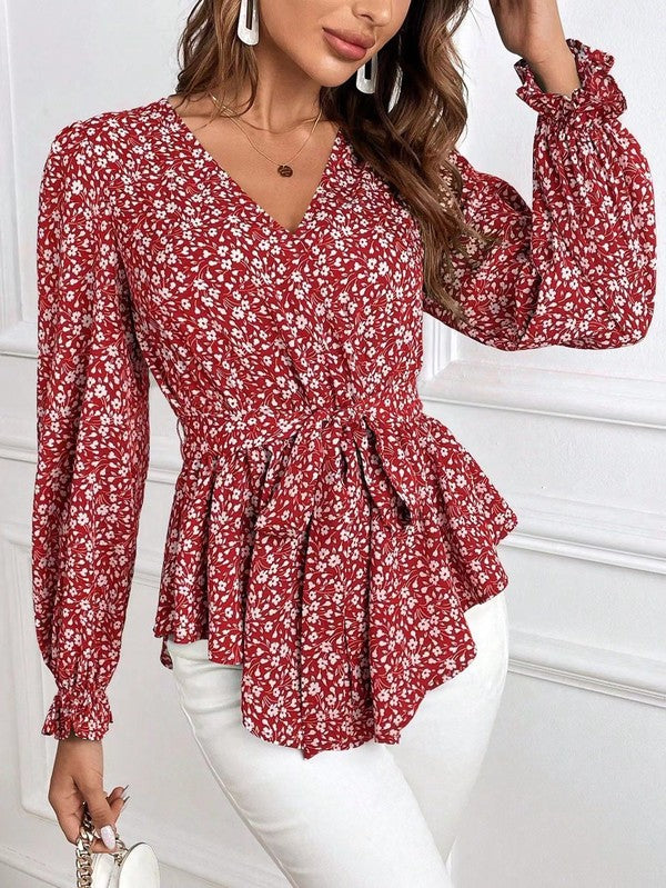 Corinne – Elegante blusa a maniche lunghe con stampa floreale e scollo a V