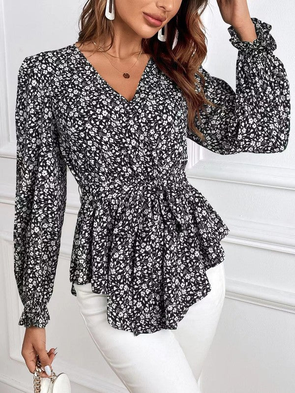 Corinne – Elegante blusa a maniche lunghe con stampa floreale e scollo a V