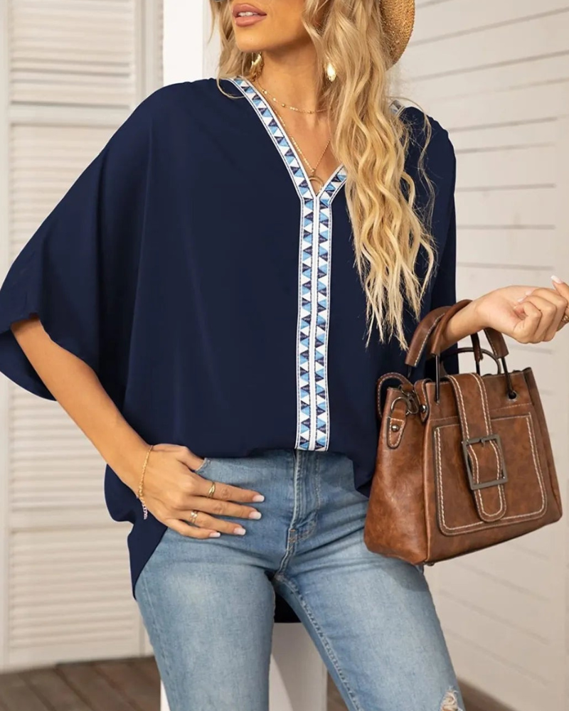 Lyla - Blusa ampia con scollo a V e maniche a pipistrello