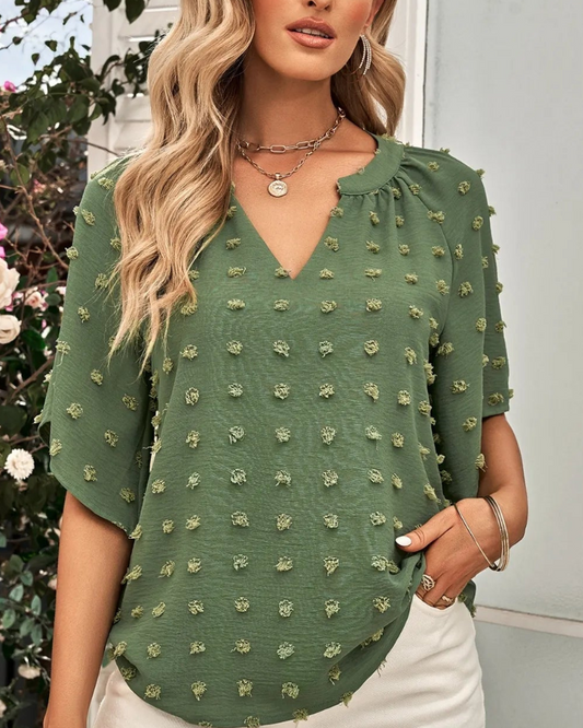 Arabella - Blusa chic a pois Swiss dot con scollo a V con intaglio e manica a metà
