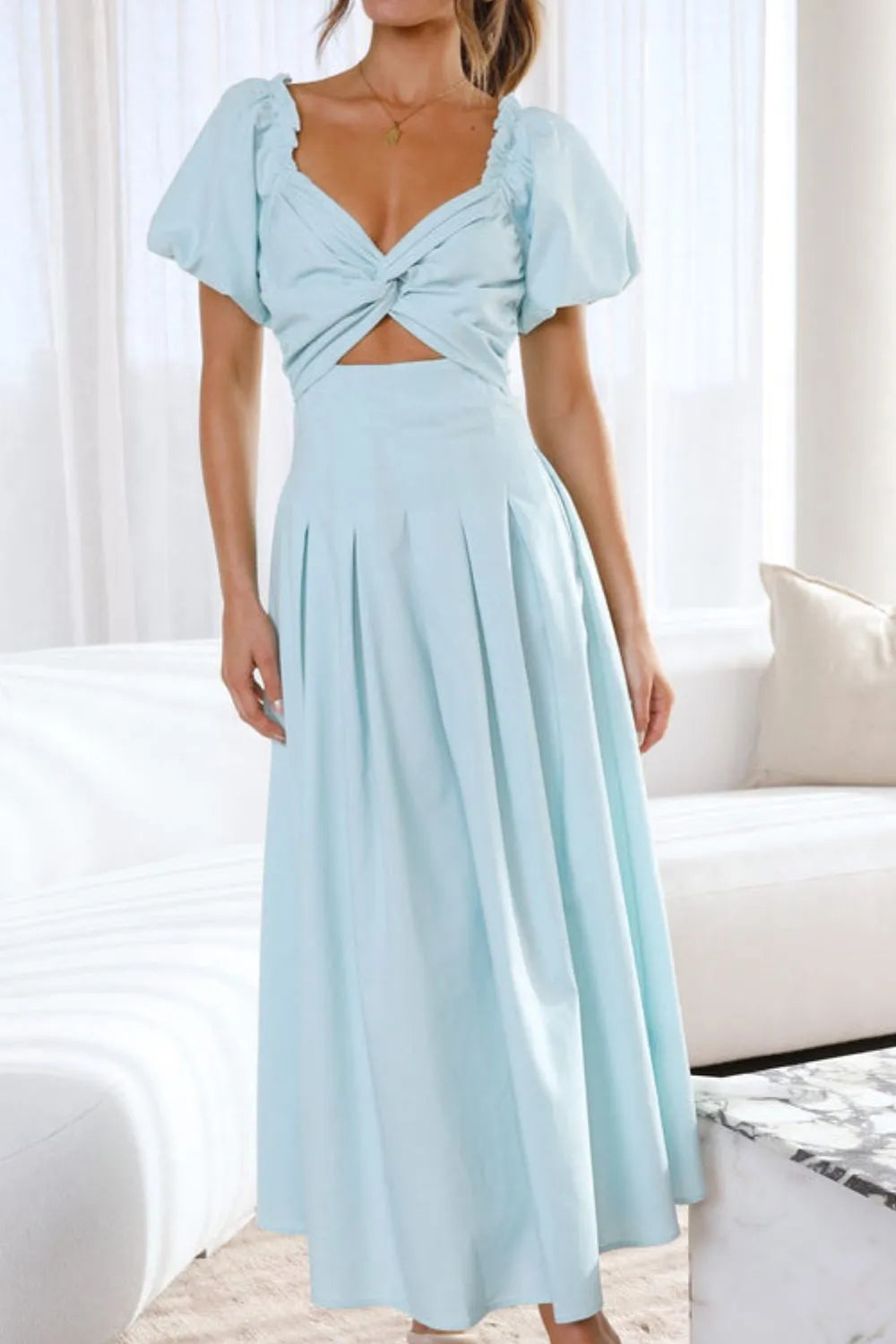 Nicolle - Elegante abito con maniche a sbuffo