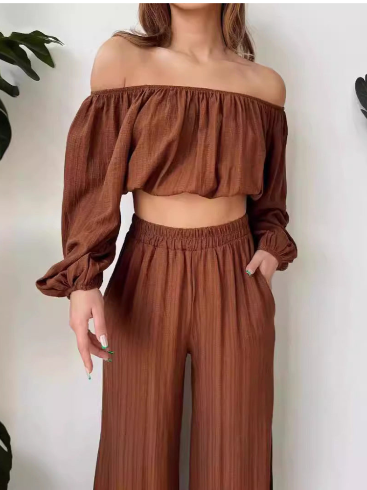 Elsa - Elegante completo con crop top off-shoulder e pantaloni a vita alta a gamba larga