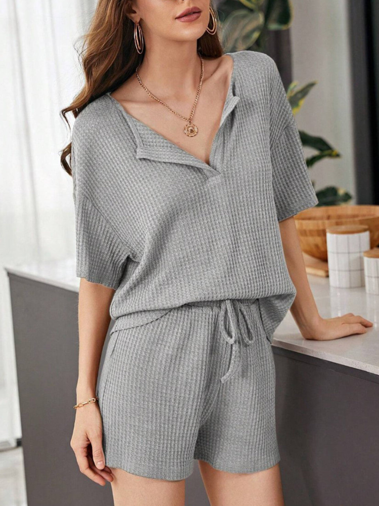 Yumi - Completo casual chic con top a maniche corte e pantaloncini larghi in maglia