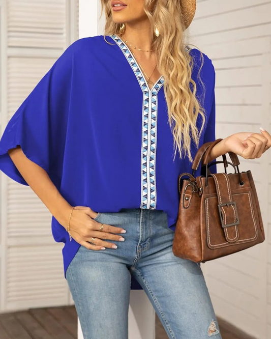 Lyla - Blusa ampia con scollo a V e maniche a pipistrello