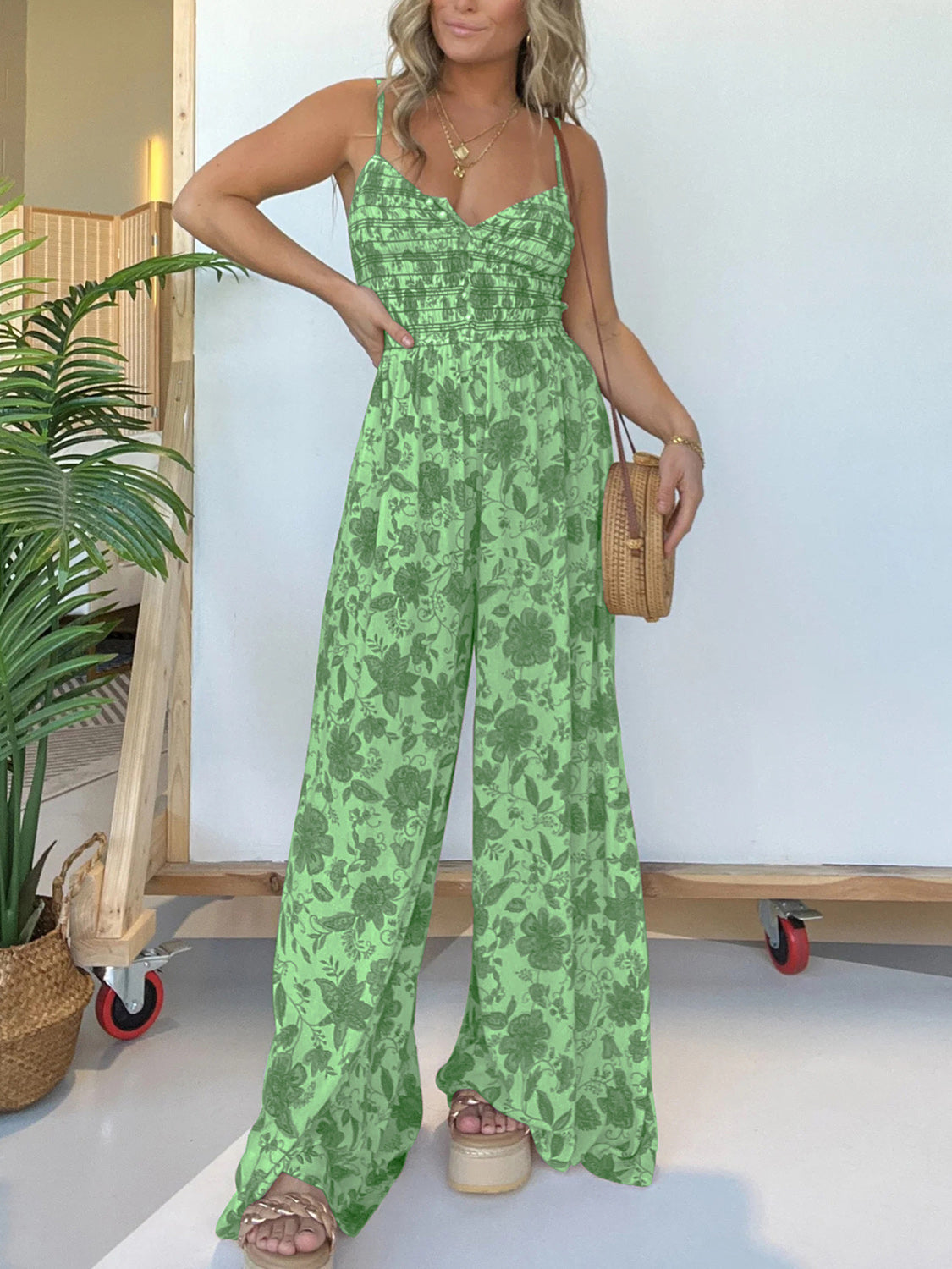 Jana - Elegante tuta floreale con spalline sottili e gamba larga