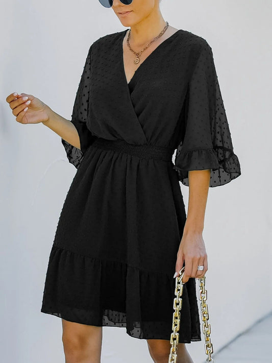 Kelsey - Elegante mini abito in tessuto Swiss Dot con maniche svasate