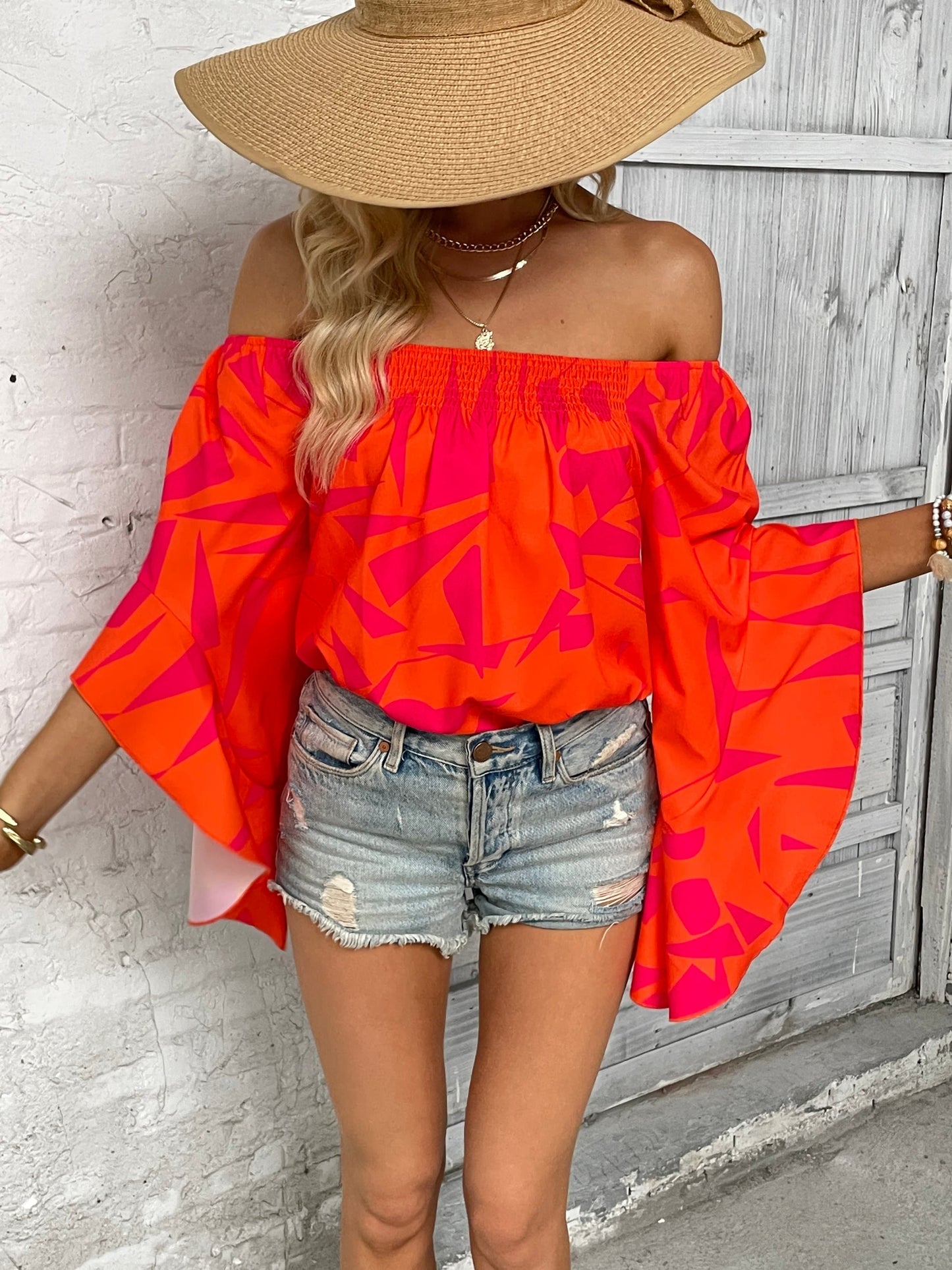 Bianca - Elegante blusa con spalle scoperte e maniche a pipistrello