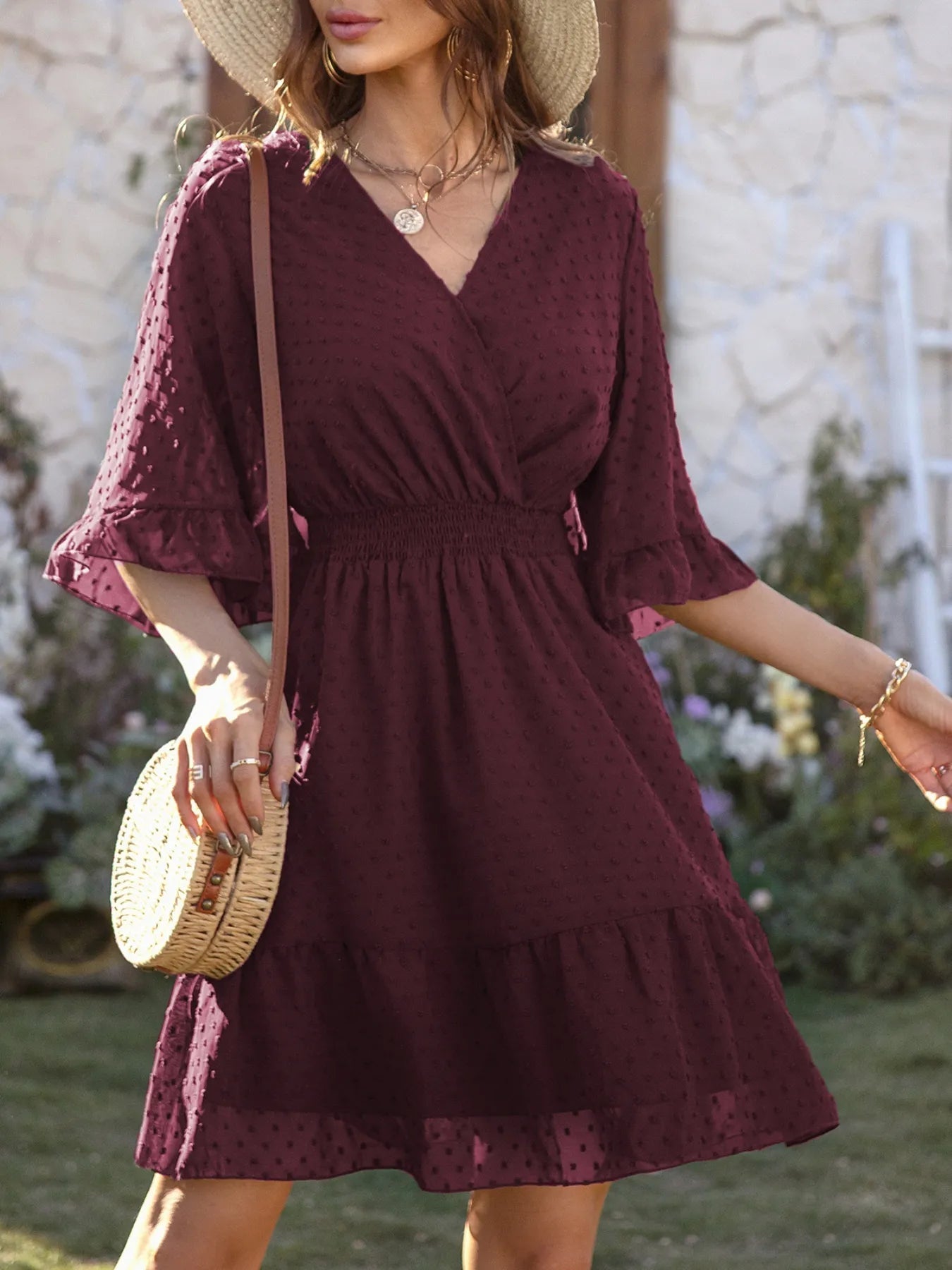 Kelsey - Elegante mini abito in tessuto Swiss Dot con maniche svasate