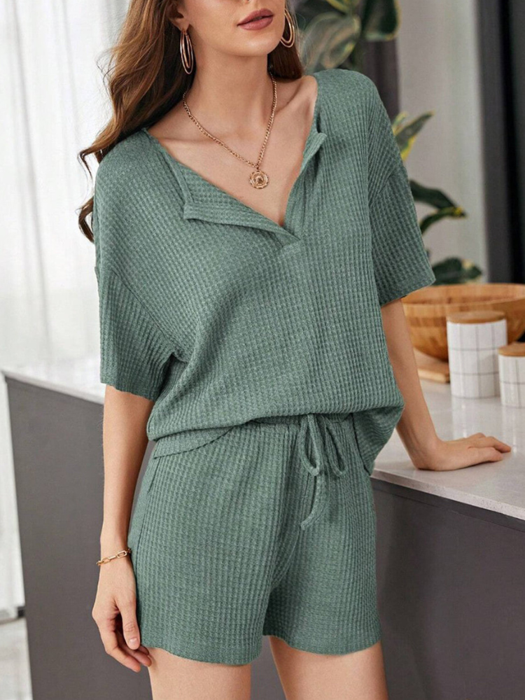 Yumi - Completo casual chic con top a maniche corte e pantaloncini larghi in maglia