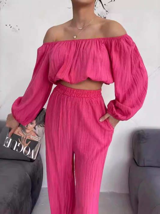 Elsa - Elegante completo con crop top off-shoulder e pantaloni a vita alta a gamba larga