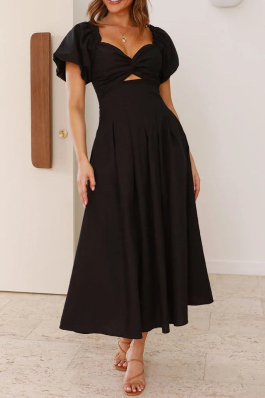 Nicolle - Elegante abito con maniche a sbuffo