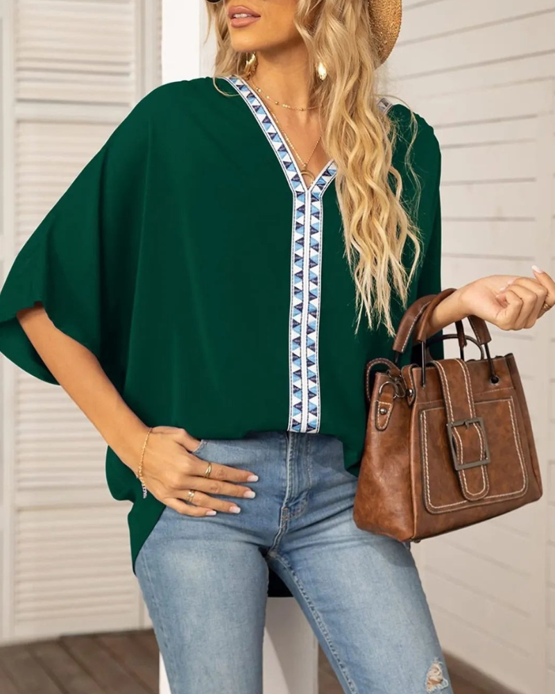 Lyla - Blusa ampia con scollo a V e maniche a pipistrello