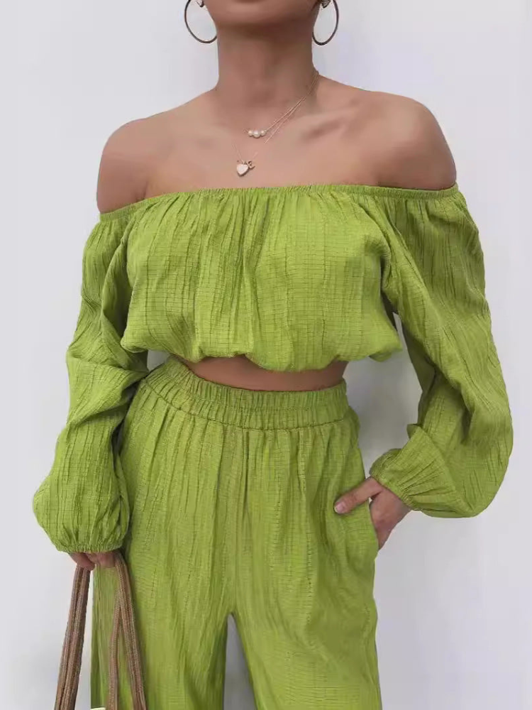 Elsa - Elegante completo con crop top off-shoulder e pantaloni a vita alta a gamba larga
