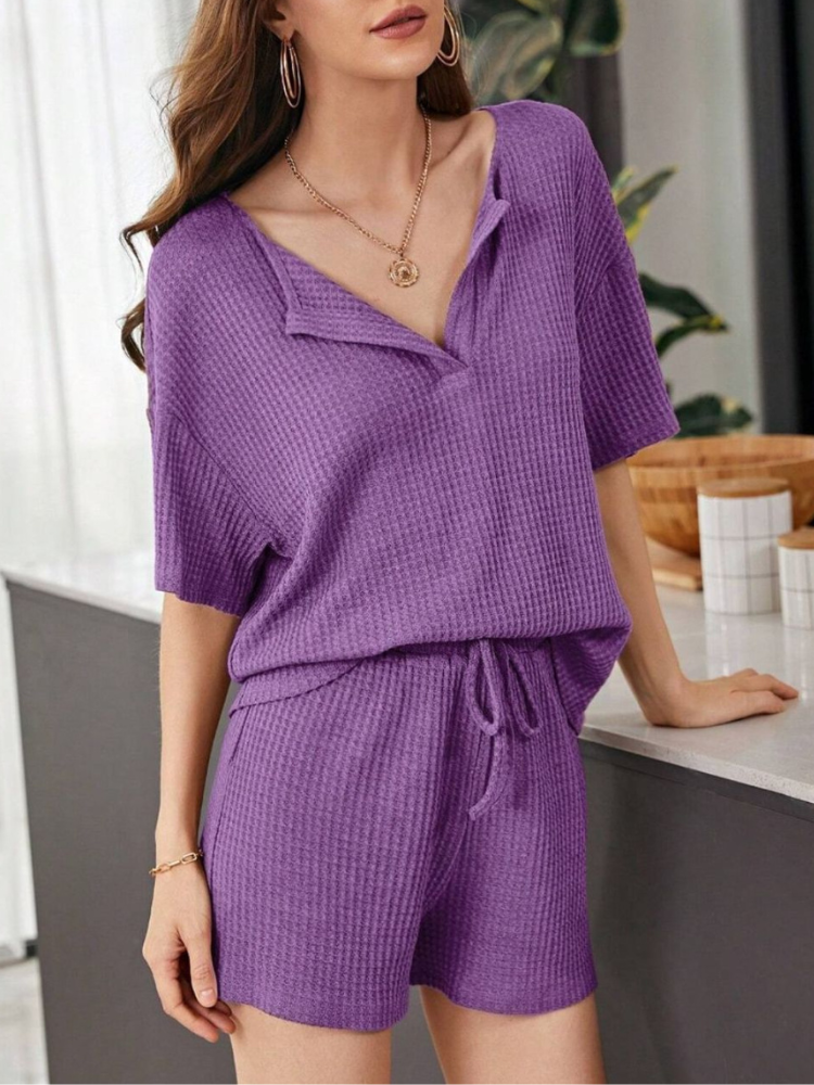 Yumi - Completo casual chic con top a maniche corte e pantaloncini larghi in maglia