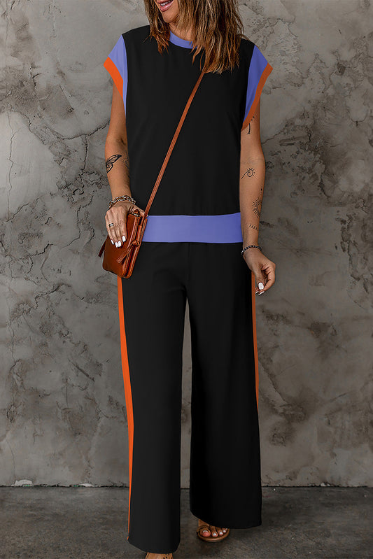 Krissy - Elegante completo con top e pantaloni larghi con scollo rotondo a contrasto
