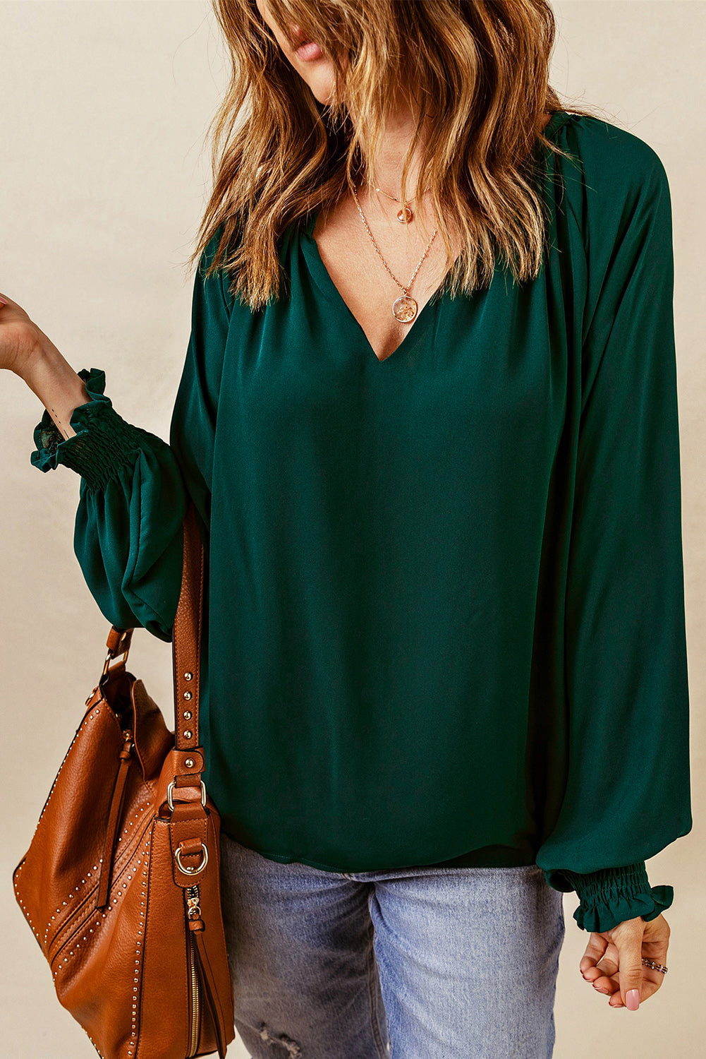 Eliana - Elegante blusa ampia a maniche lunghe con scollo a V con risvolto