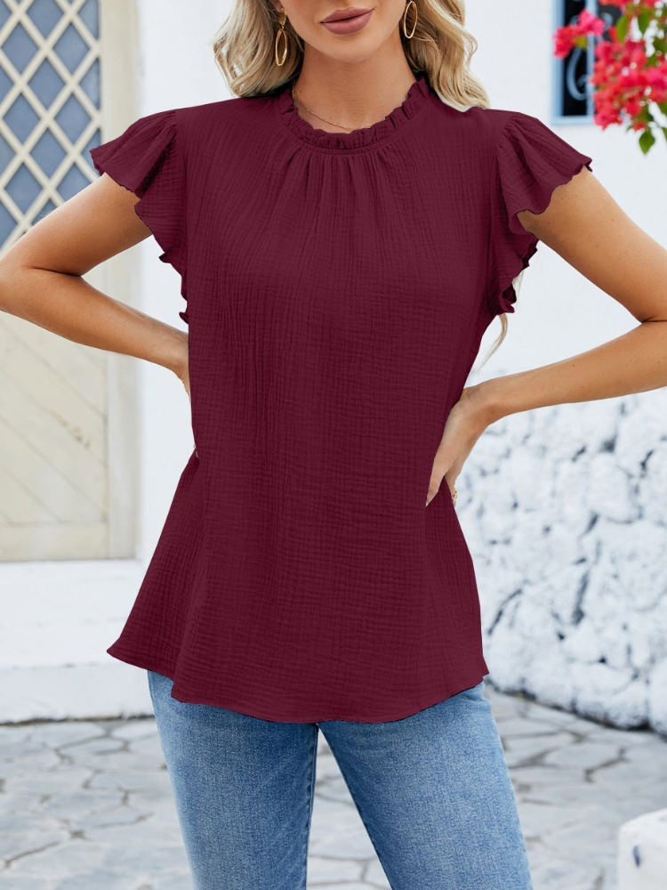 Hazel - Blusa elegante con maniche plissettate e volant