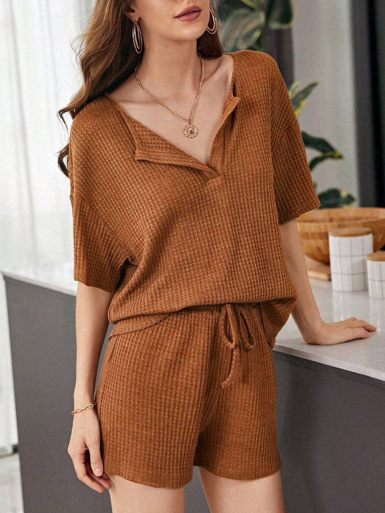 Yumi - Completo casual chic con top a maniche corte e pantaloncini larghi in maglia