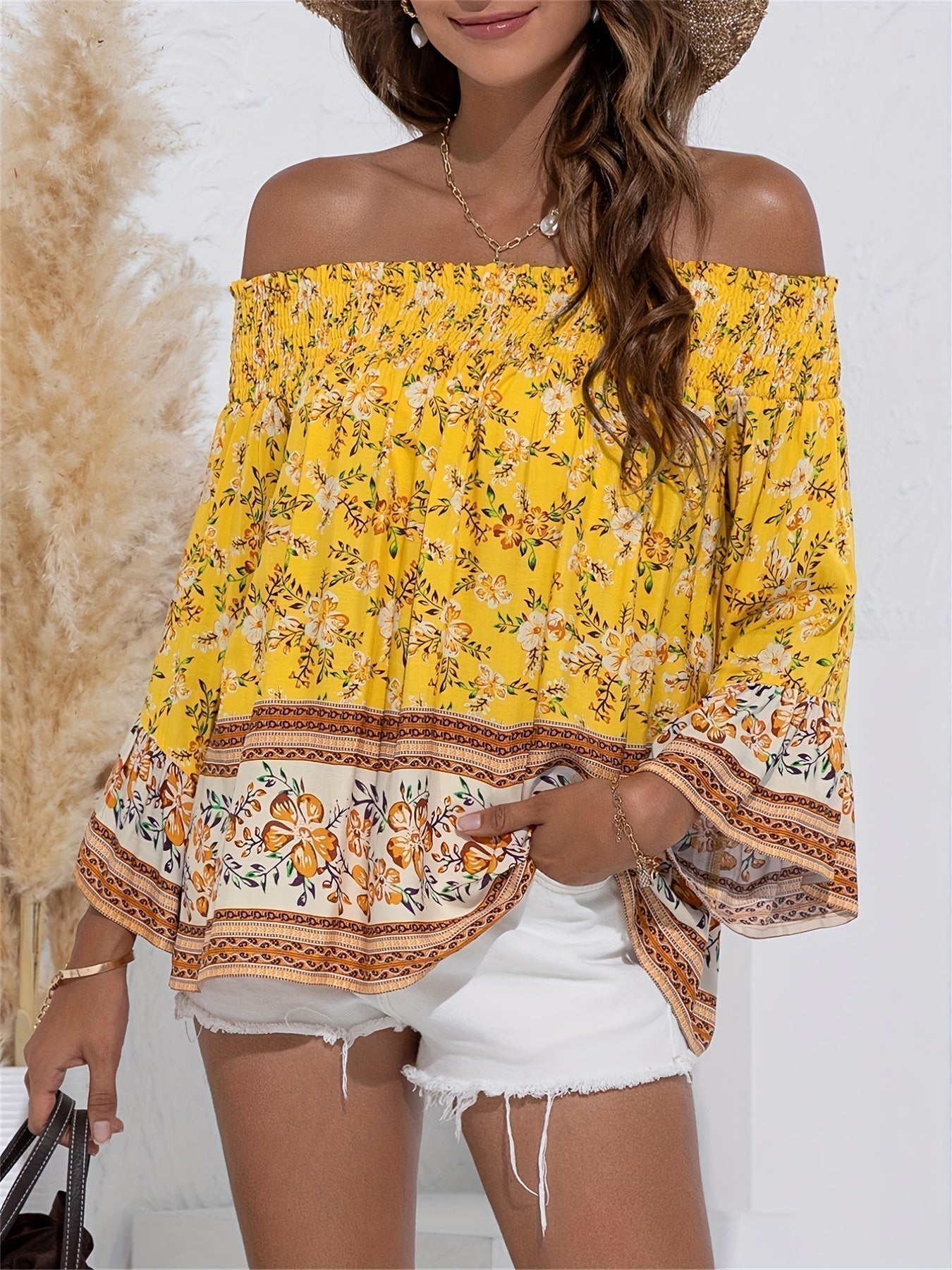 Audrey - Elegante blusa con estampato floreale e spalle scoperte