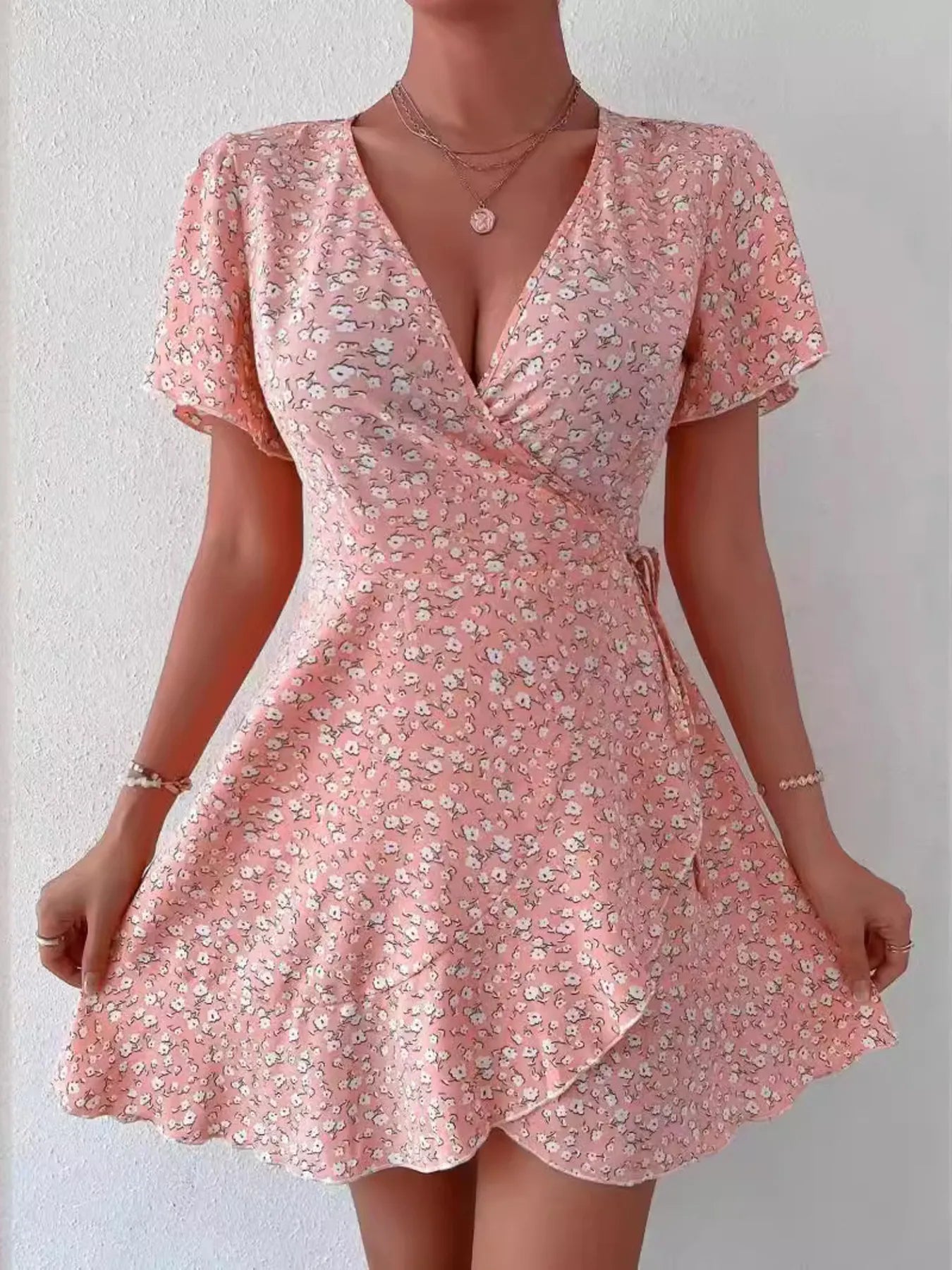 Rosanna - Elegante mini abito floreale con maniche corte e profondo scollo a V