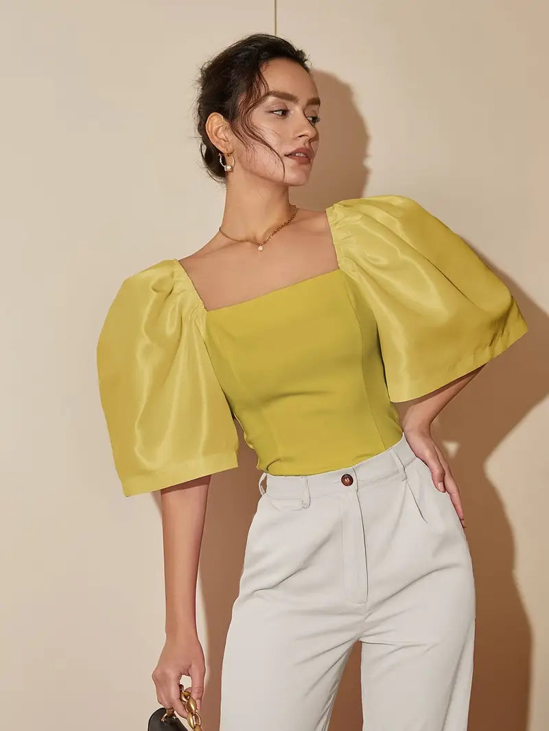 Connie - Elegante top con maniche a sbuffo e scollo quadrato