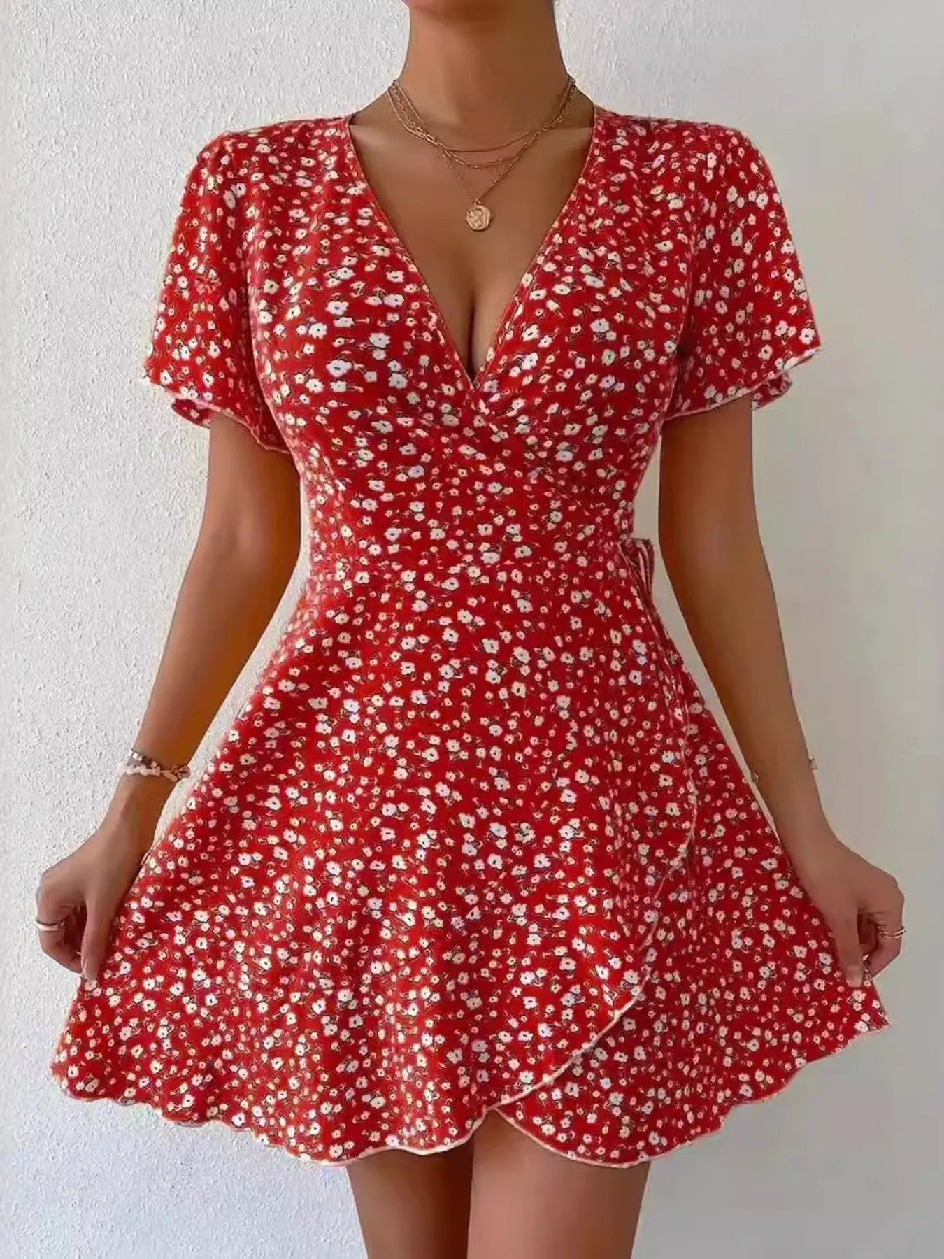 Rosanna - Elegante mini abito floreale con maniche corte e profondo scollo a V