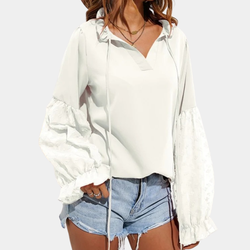 Xamira - Elegante blusa ampia con maniche a sbuffo e collo annodato