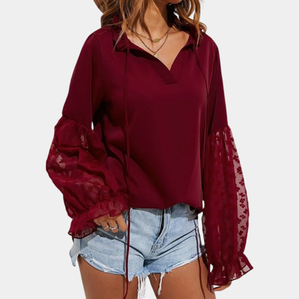 Xamira - Elegante blusa ampia con maniche a sbuffo e collo annodato