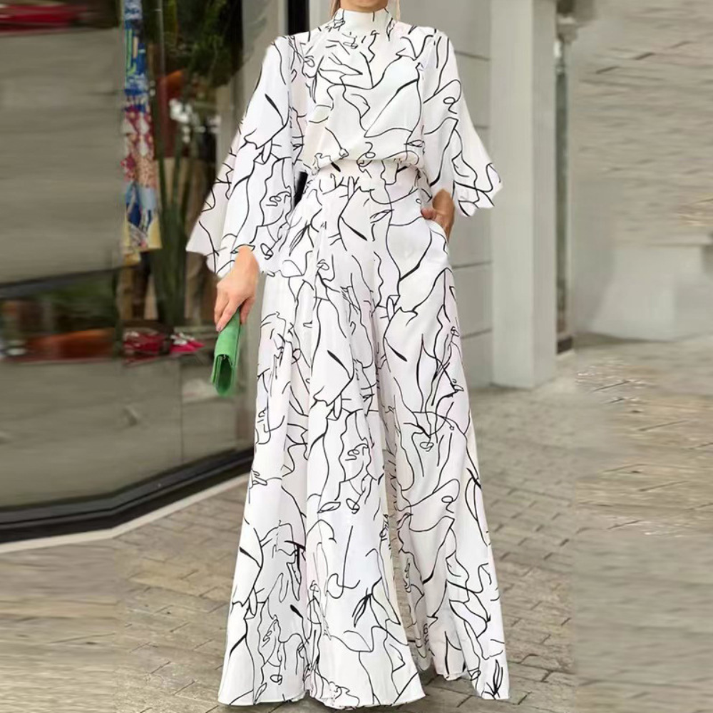 Celia - Elegante tuta a maniche lunghe con stampa astratta