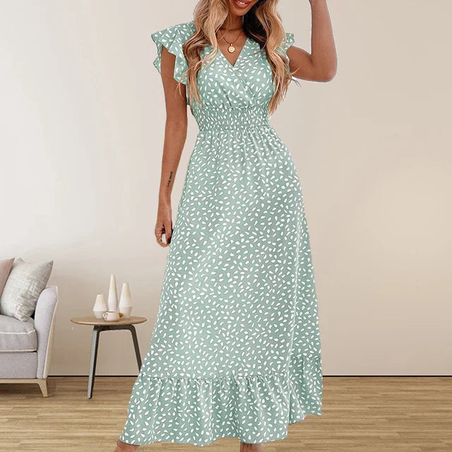 Hannelie - Elegante abito lungo in chiffon senza maniche con volant e scollo a V