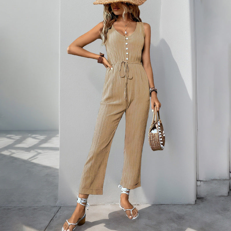 Nora - Tuta smanicata con bottoni dal look casual