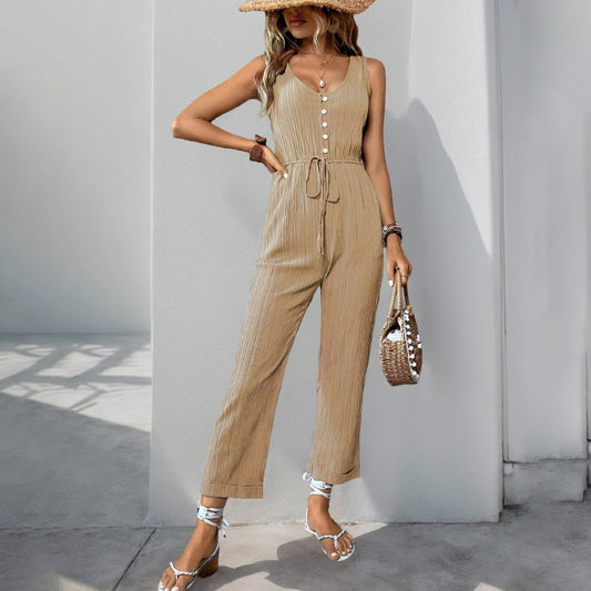 Nora - Tuta smanicata con bottoni dal look casual