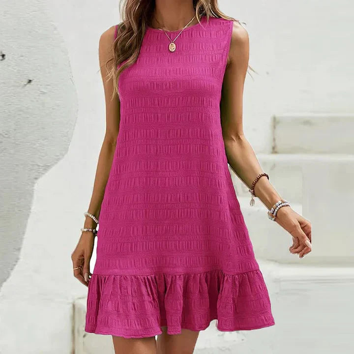 Milena - Elegante minidress senza maniche con volant sull’orlo