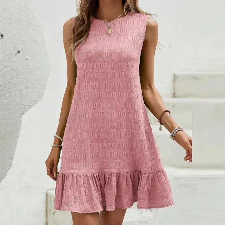 Milena - Elegante minidress senza maniche con volant sull’orlo