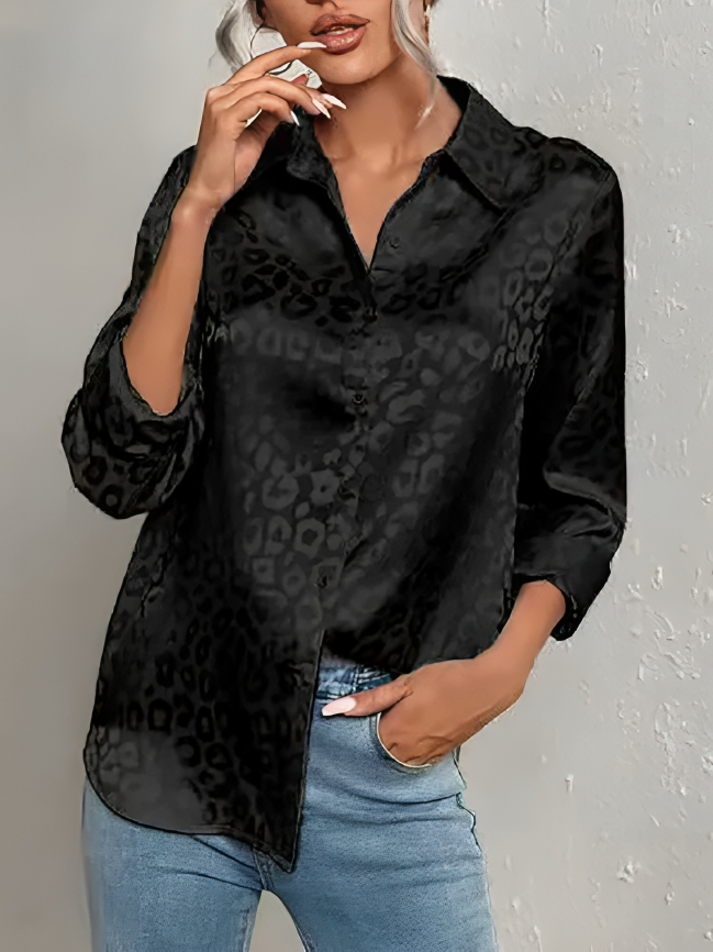 Quinasha – Elegante blusa polo a maniche lunghe con stampa leopardata